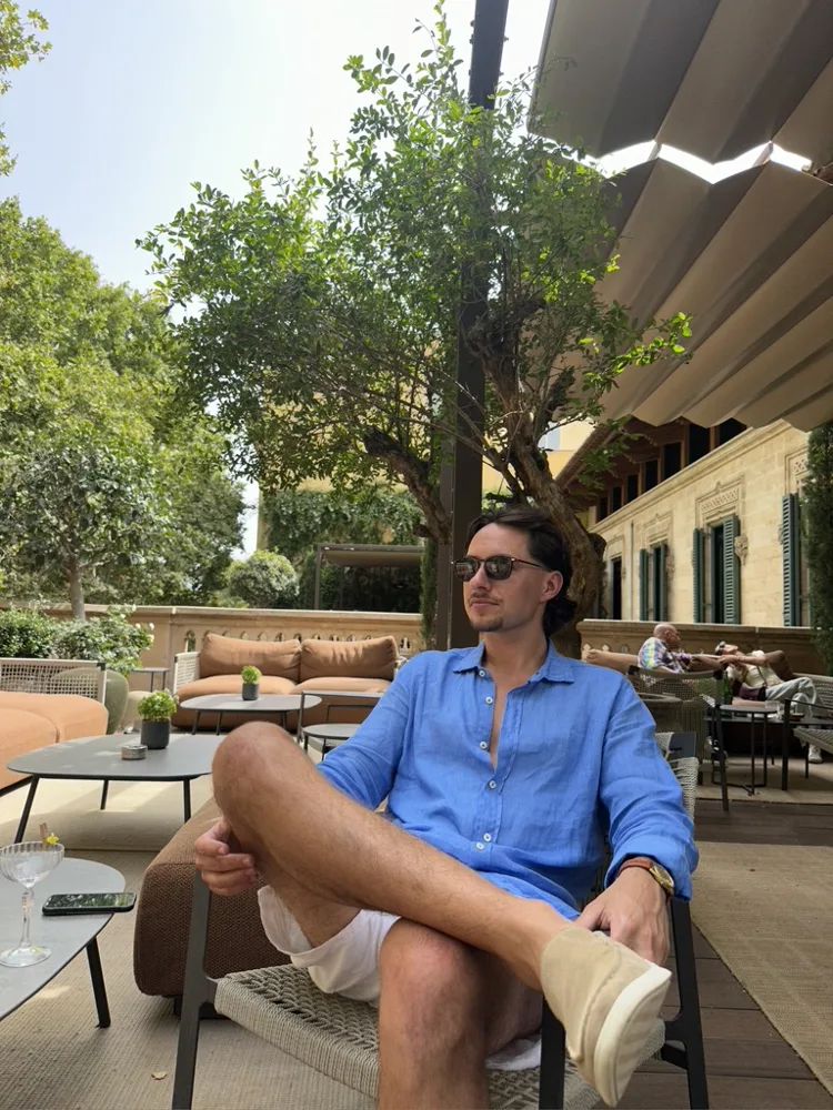 Jack relaxing on a sunny terrace